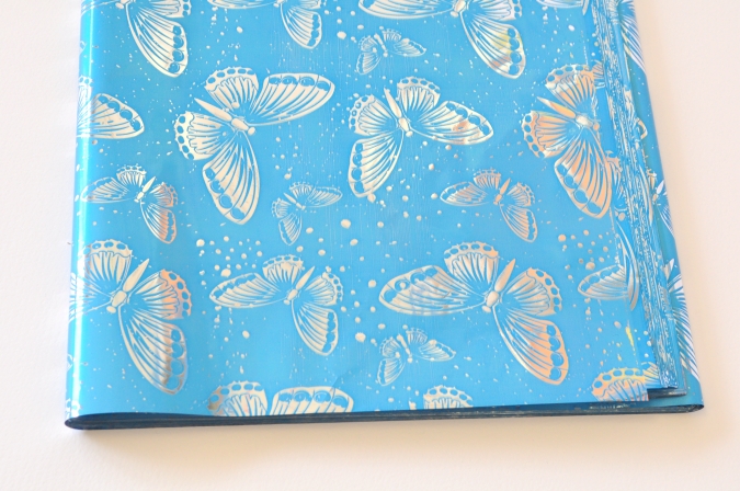 Опаковъчно фолио, Целофан цвят син с пеперуди, 100x70см /Tr/